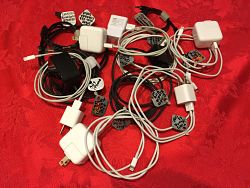 image of a bunch of tagged chargers and adapters